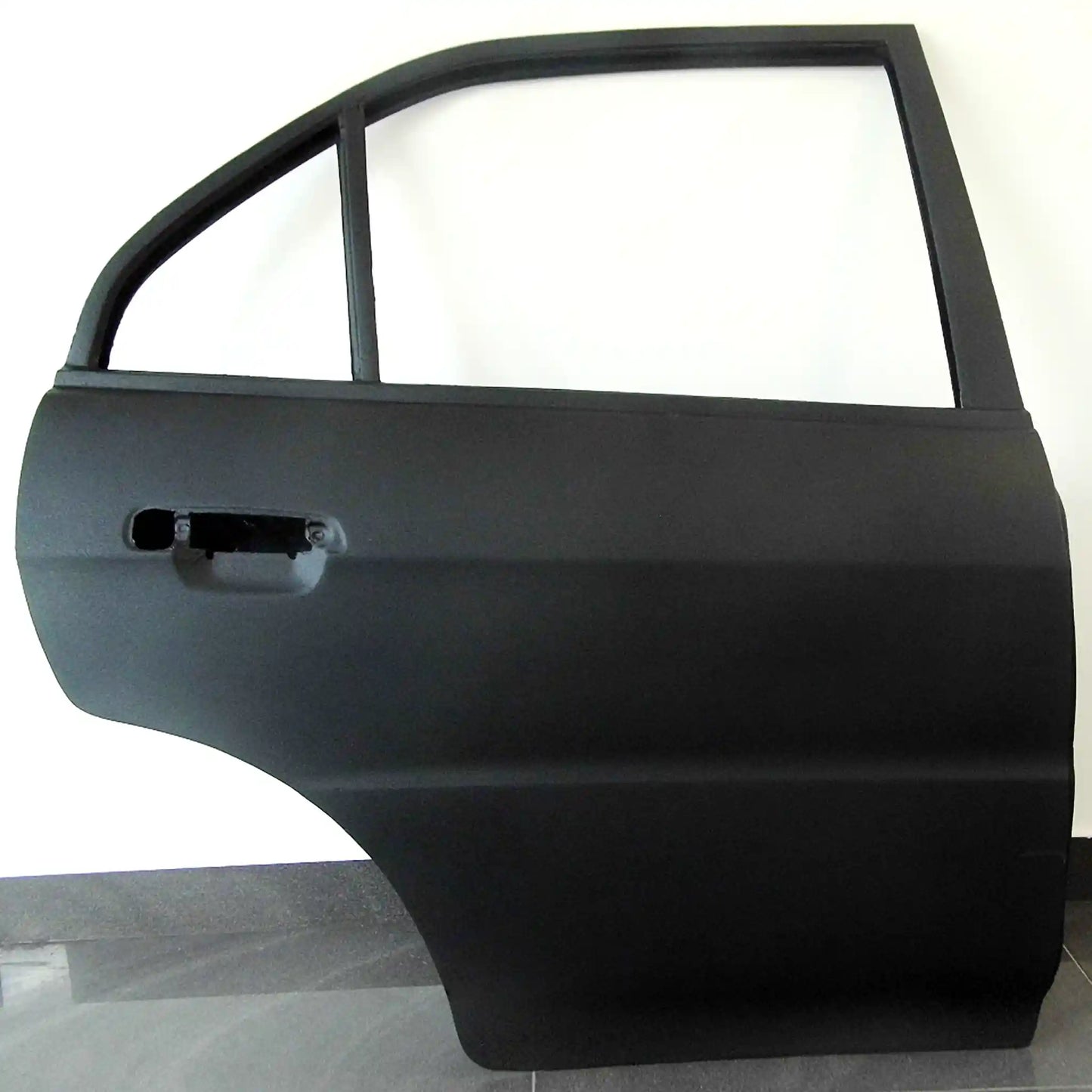 Fibreglass rear door for Mitsubishi Lancer Evo 4, 5, and 6 Ð lightweight performance body panel