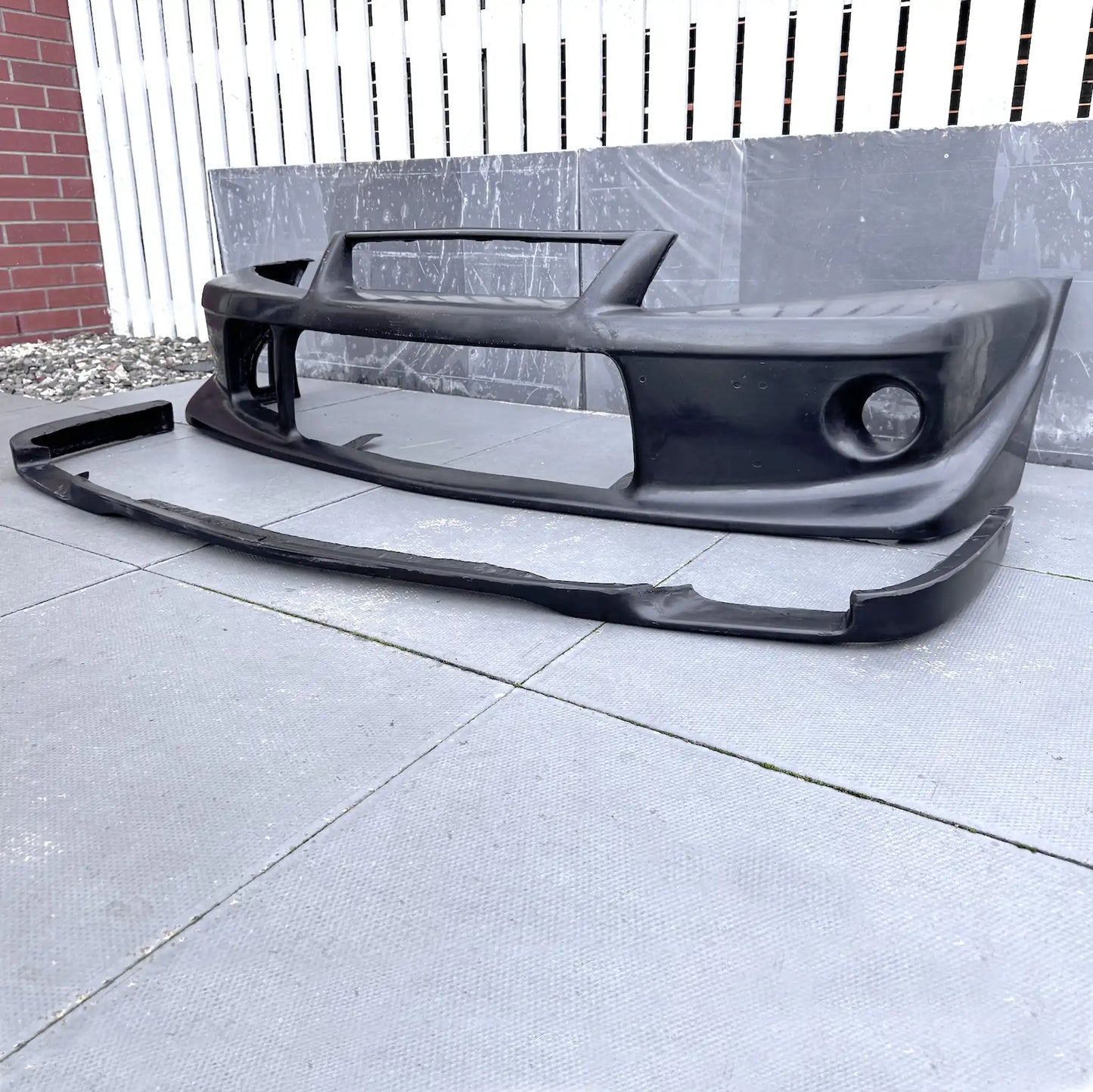 Fibreglass Tommi Makinen Edition front bumper for Mitsubishi Evo 6 Ð lightweight, race-inspired style