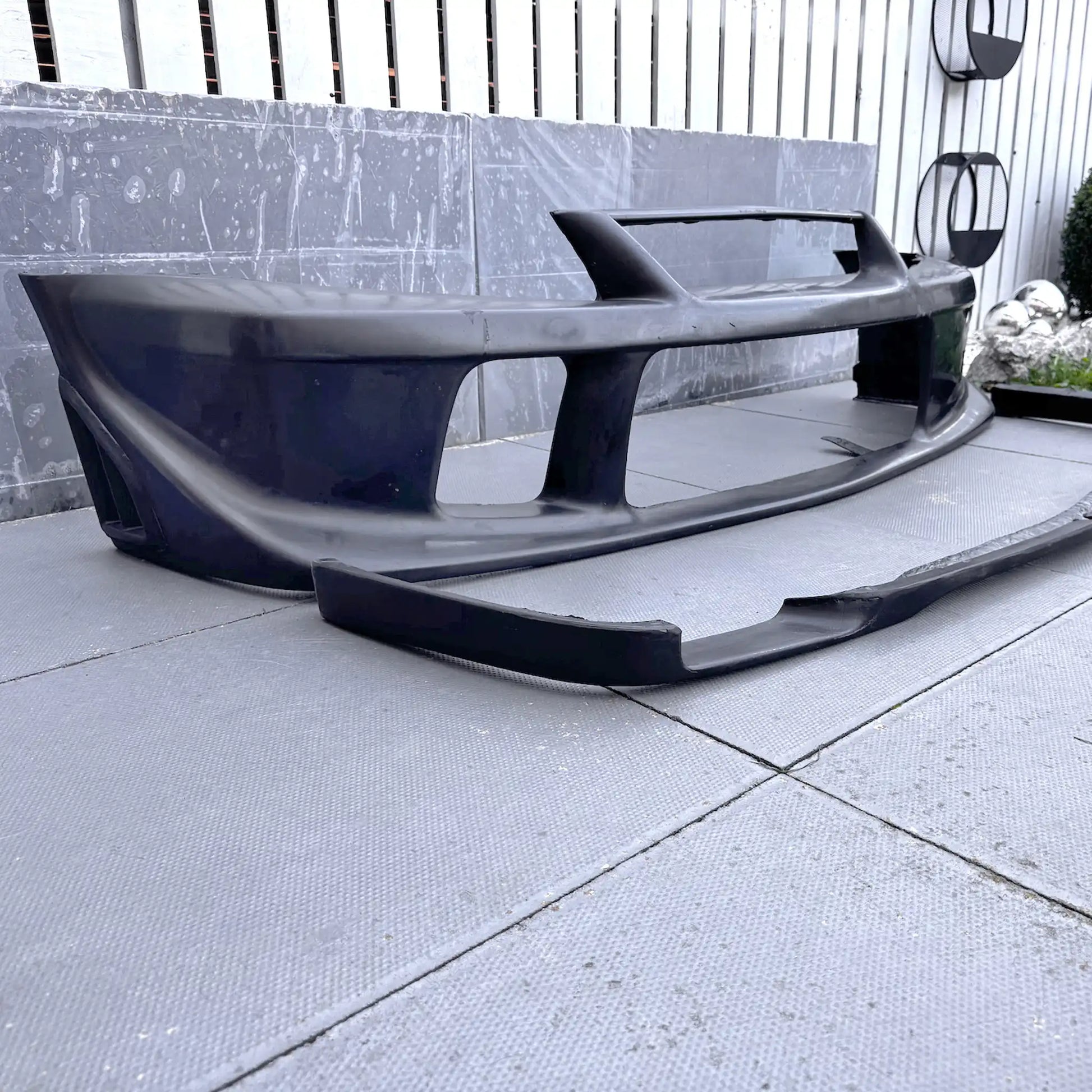 Fibreglass Tommi Makinen Edition front bumper for Mitsubishi Evo 6 Ð lightweight, race-inspired style