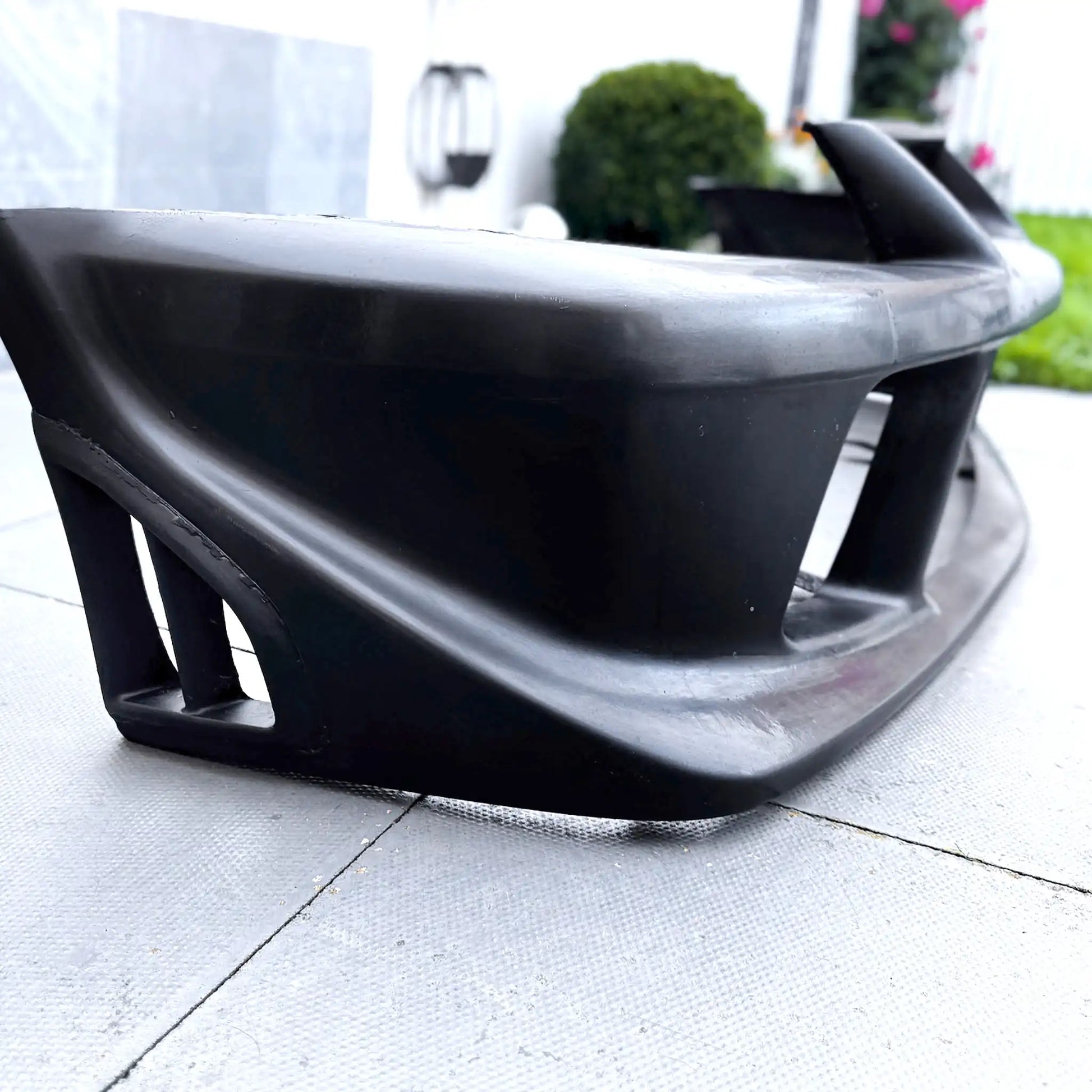 Fibreglass Tommi Makinen Edition front bumper for Mitsubishi Evo 6 Ð lightweight, race-inspired style