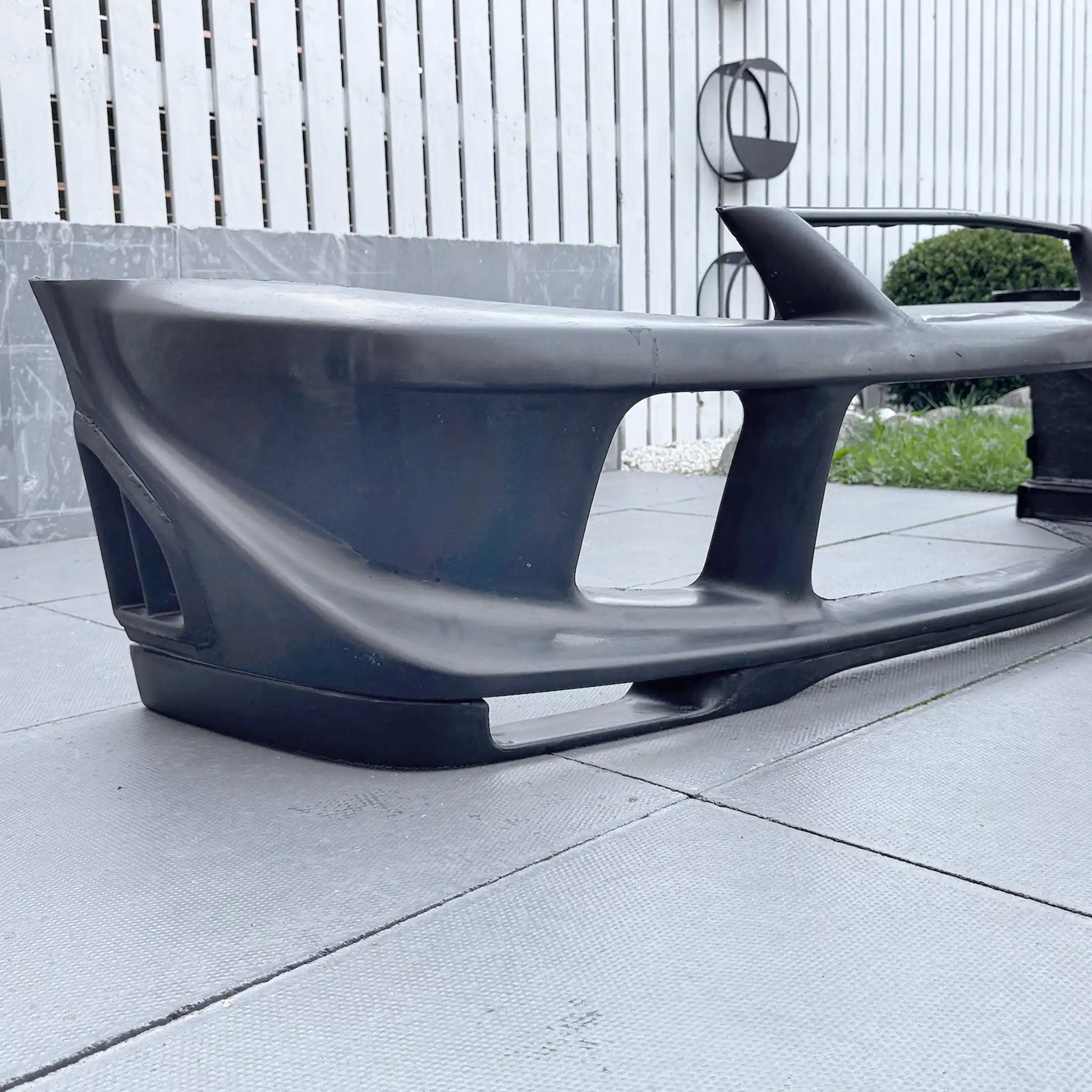 Fibreglass Tommi Makinen Edition front bumper for Mitsubishi Evo 6 Ð lightweight, race-inspired style