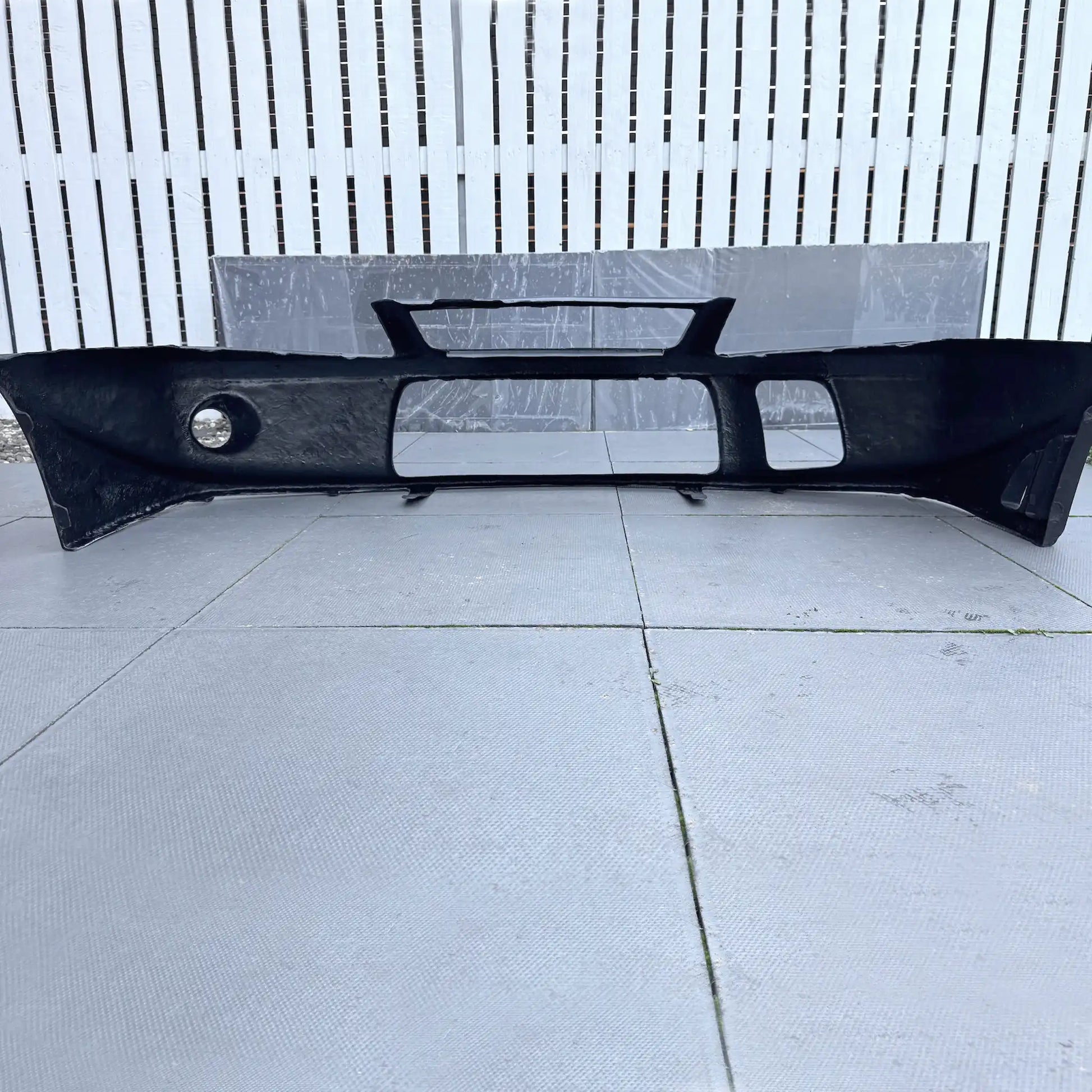 Fibreglass Tommi Makinen Edition front bumper for Mitsubishi Evo 6 Ð lightweight, race-inspired style