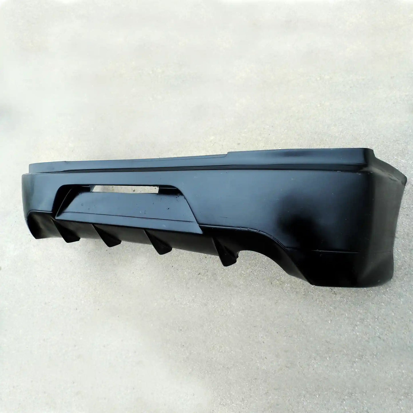 Fibreglass rear bumper for Mitsubishi Lancer Evo 8 and 9 Ð lightweight, durable, performance part